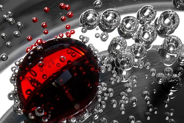 Water drops with a red drop