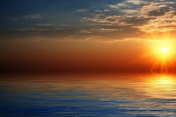 Beautiful sunset and sunrise over the sea surface