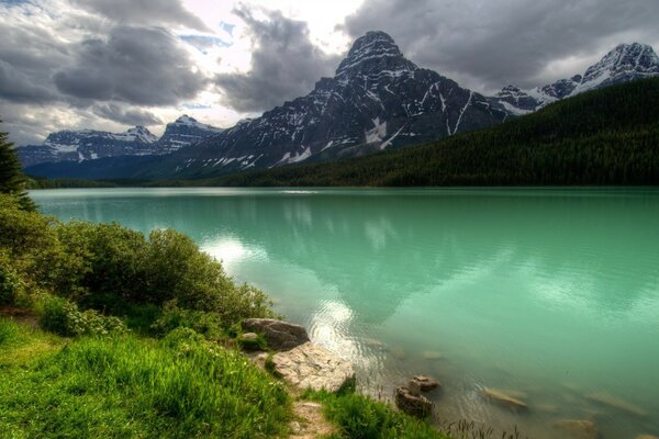 Beautiful lake on the background of snowy mountains