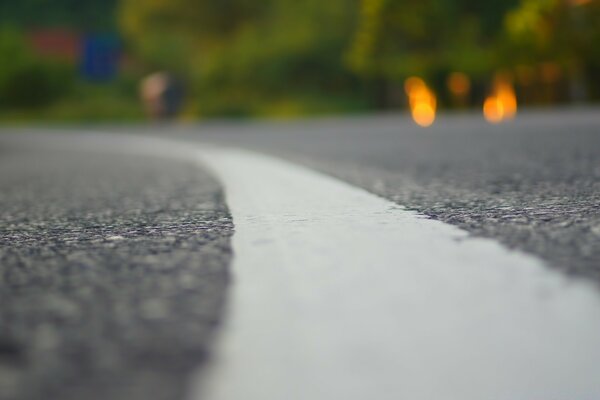 Road markings on an asphalt road