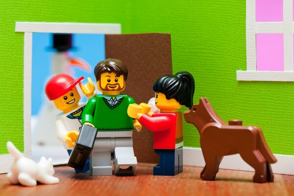 Lego toys depicting a family in the house