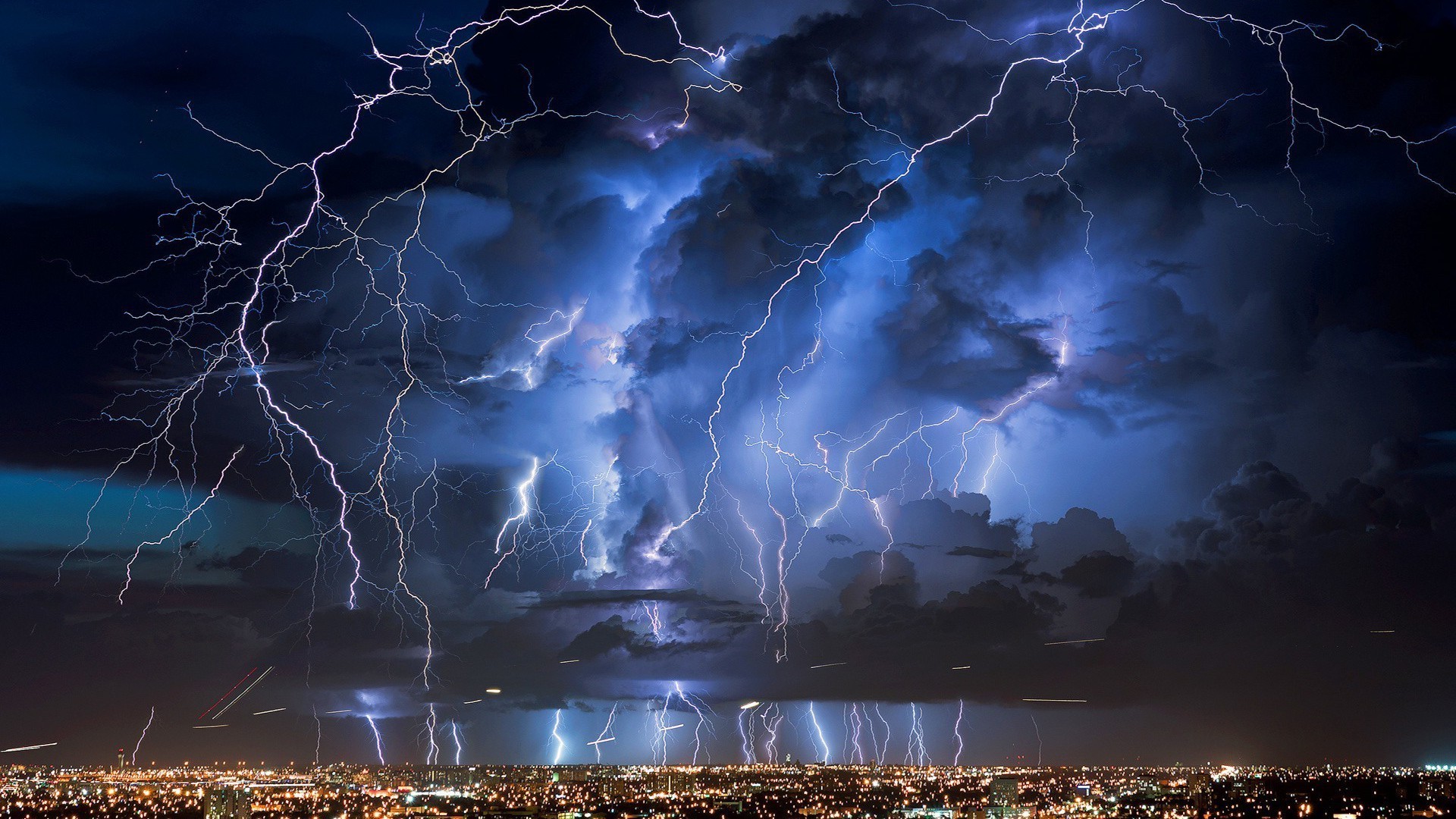 lightning storm thunder thunderstorm thunderbolt danger dark strike flash sky rain desktop light calamity abstract weather energy dramatic nature ocean