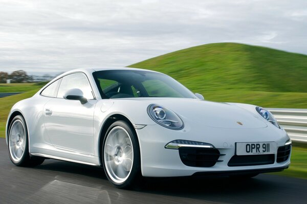 White Porsche on the highway