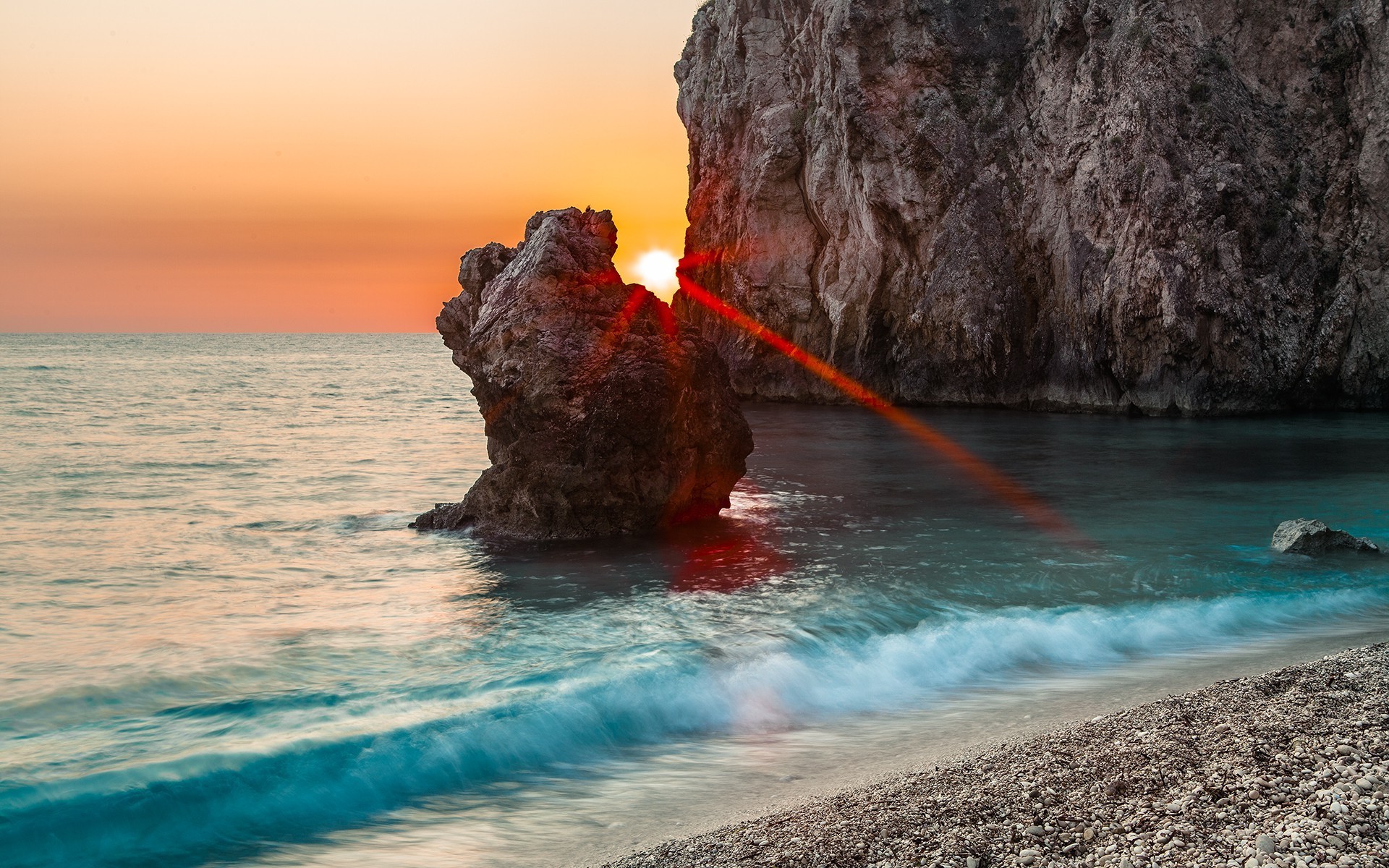 rocce massi e rocce massi e rocce acqua spiaggia oceano mari mare surf viaggi paesaggio vacanze onda roccia isola