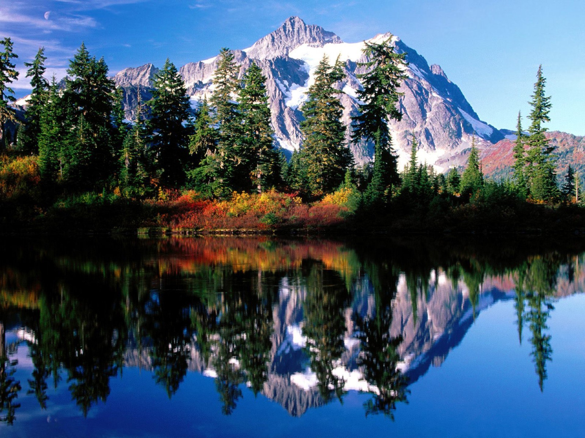 lugares famosos reflexión agua lago montañas nieve naturaleza madera escénico viajes paisaje al aire libre árbol cielo