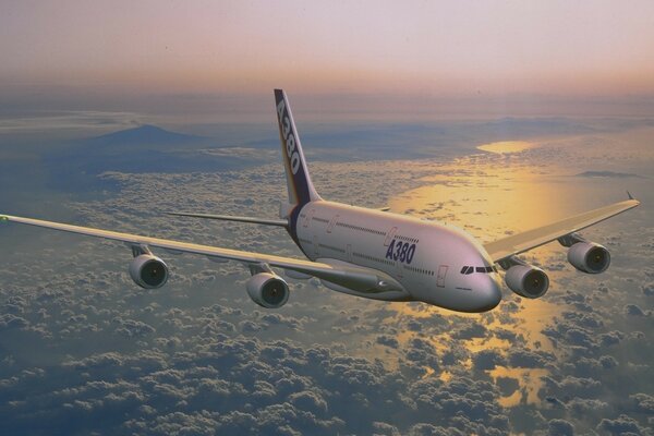 Hovering aircraft in the evening above the clouds