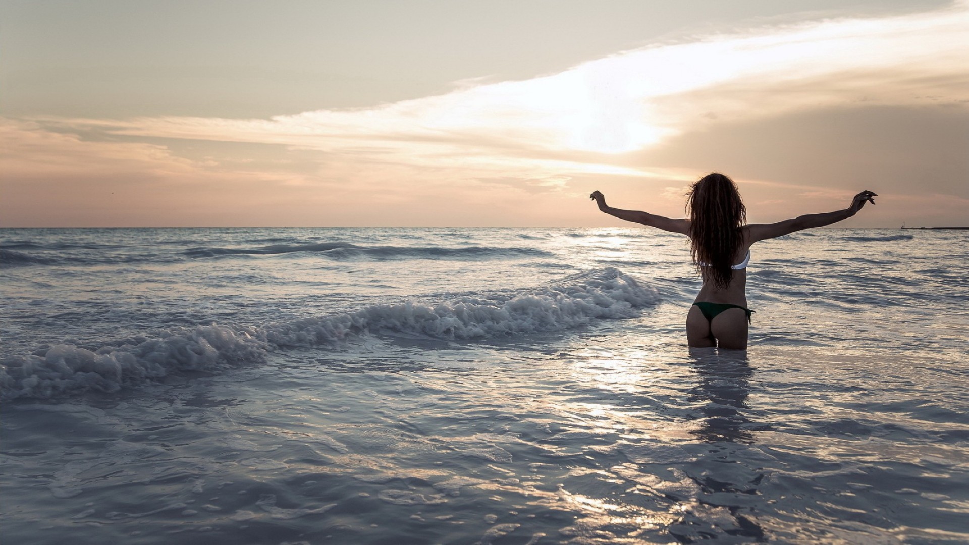 girls in water beach sea ocean water sunset surf sun seashore dawn wave travel sand sky storm leisure summer