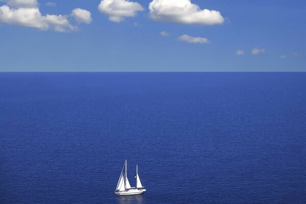 One yacht in the middle of the ocean