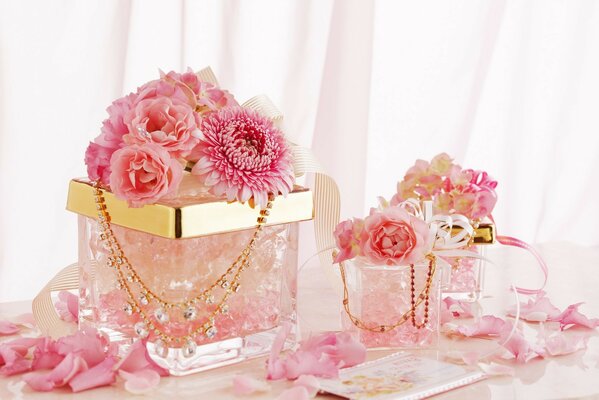 Beautiful flowers and decorations in transparent boxes