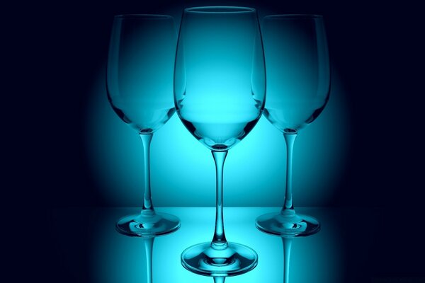 Transparent glasses on a blue background