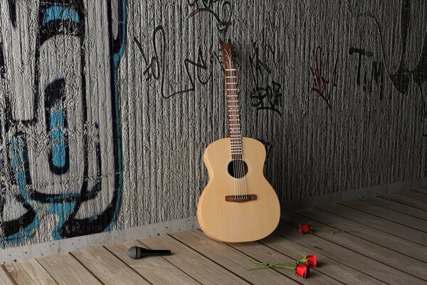 Guitare solitaire près du mur avec des graffitis