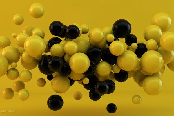 Palline 3D gialle e nere su sfondo giallo