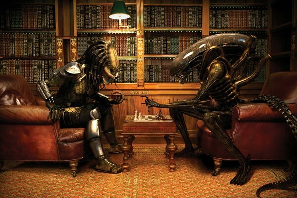 Alien and predator play chess