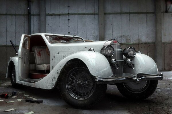 White vintage car in the garage