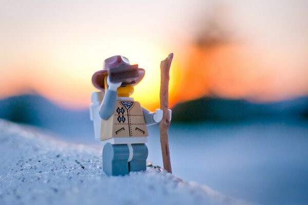 Lego man travels in the snow