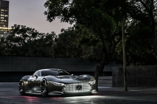 Glossy car on wet asphalt