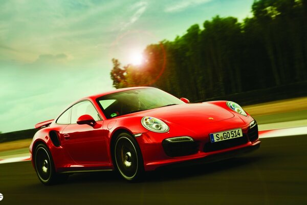 Red Porsche 911 on the road