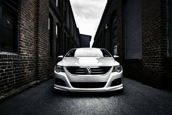 Volkswagen car in a narrow alley