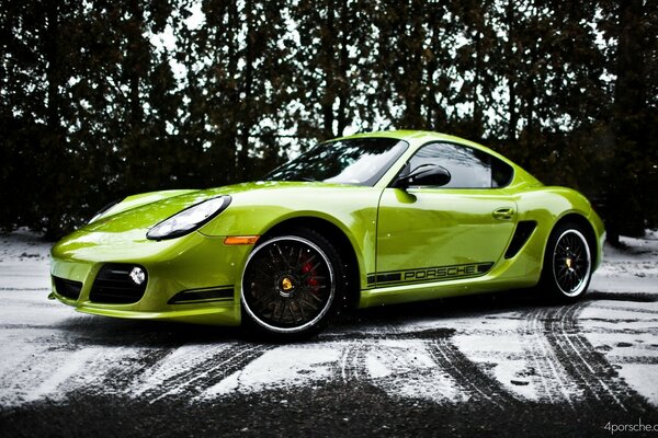 Pistachio car on a snowy road background