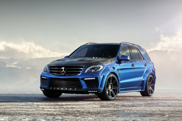 Cool blue mercedes on the beach