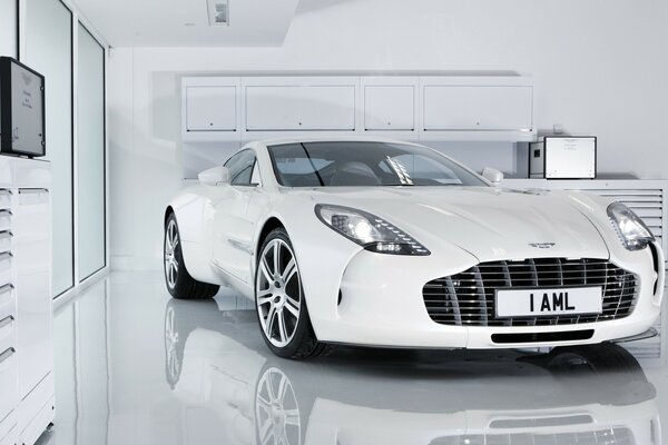 A white car in a white room