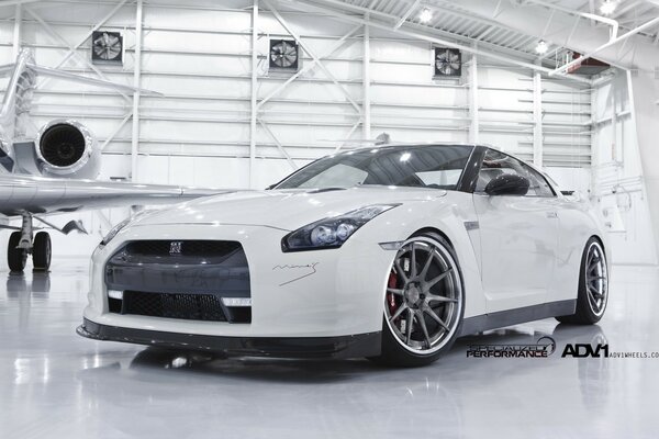 Beautiful white car in a white garage