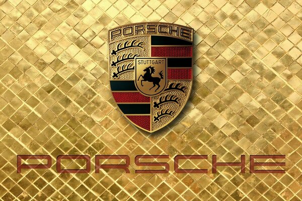 Emblème Porsche sur une mosaïque dorée