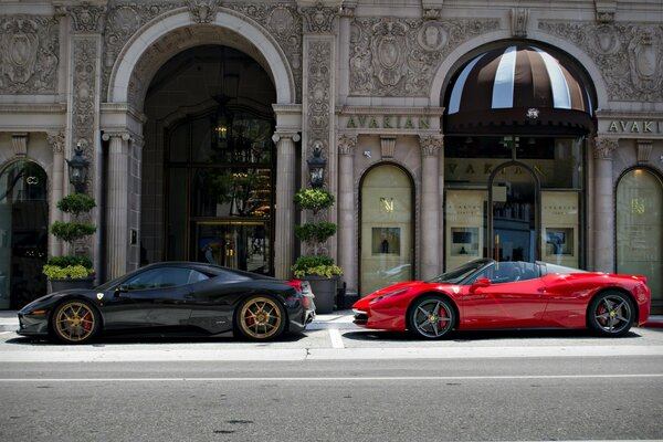 Expensive cars standing on the street