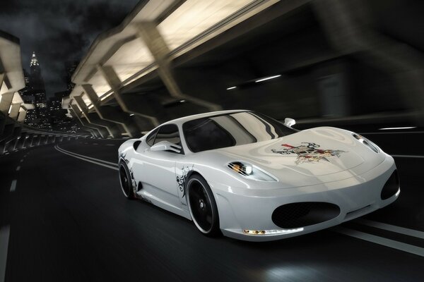 A white car in motion through the tunnel