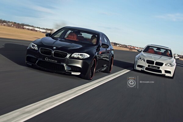 Two cars on the background of the road