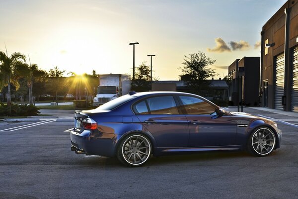 Blue sports car at dawn