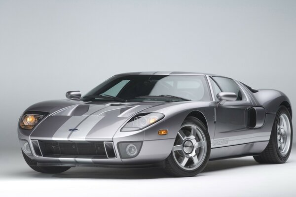 Grey sports car on a grey background