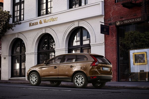 A car on the background of an ancient architectural ensemble