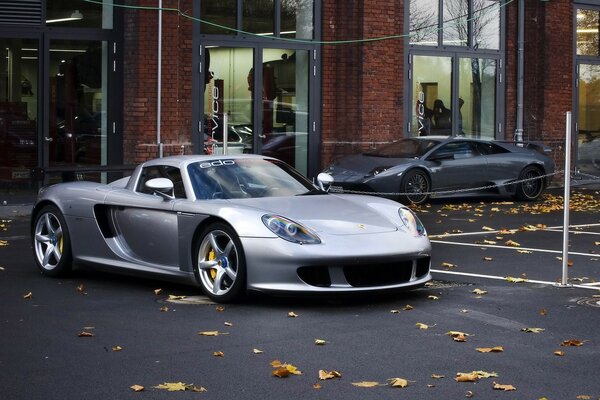 A sports car in the city. Autumn Street