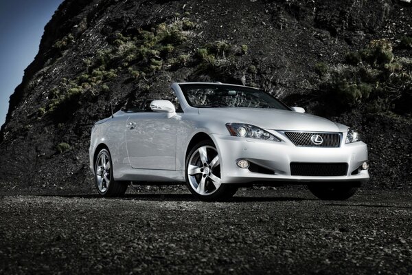 Silver car, convertible on asphalt