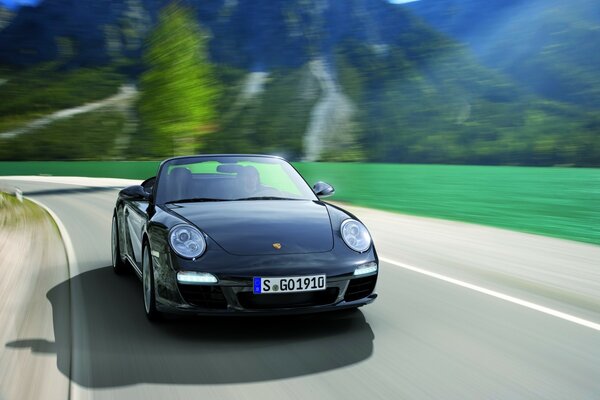 A car on the background of a hilly landscape