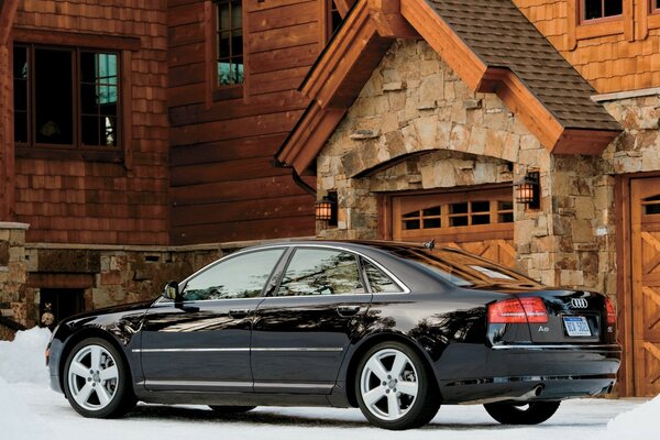 A car near a suburban house or cottage