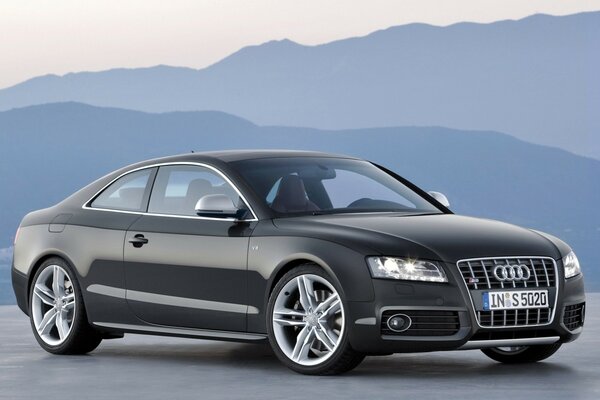 Black two-door Audi car