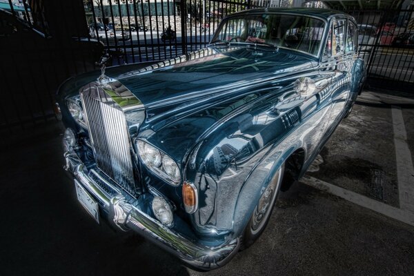 Ghost car at the iron fence