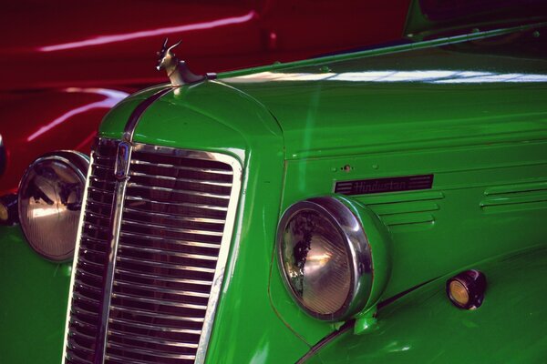 Bumper of a green retro car