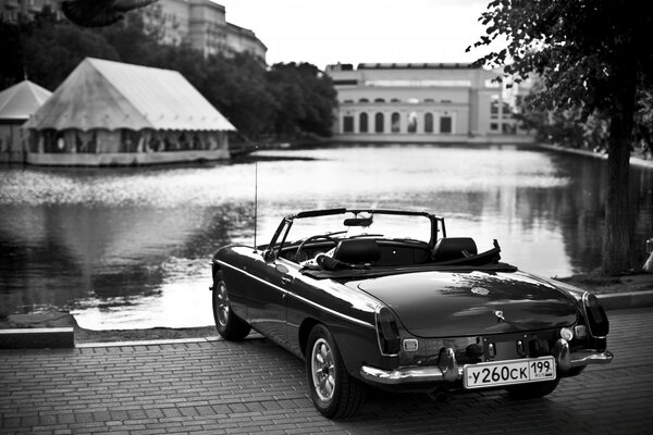 Black and white photo of a retro car