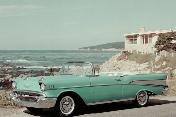 Wet car wash cabriolet on the seashore