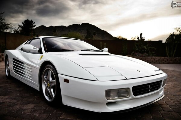 White retro car in the twilight of the roads