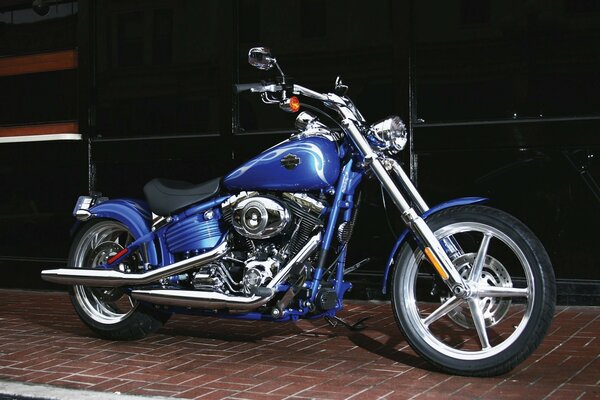 The blue motorcycle is ready to ride