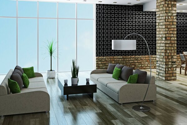 Zwei weiße Sofas mit grünen Kissen
