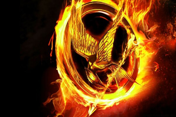 Mockingjay sullo sfondo del fuoco