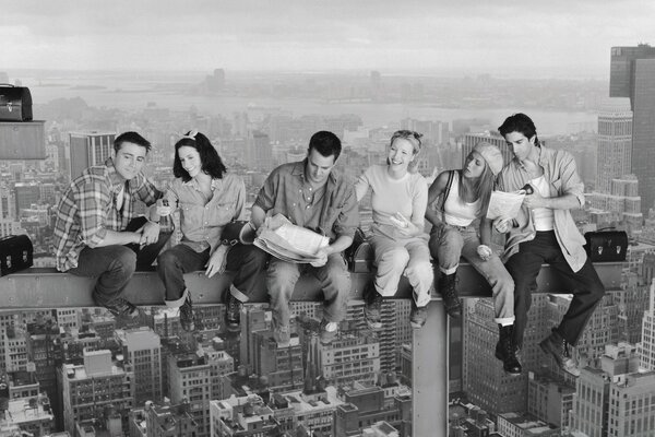 Friends on a construction beam