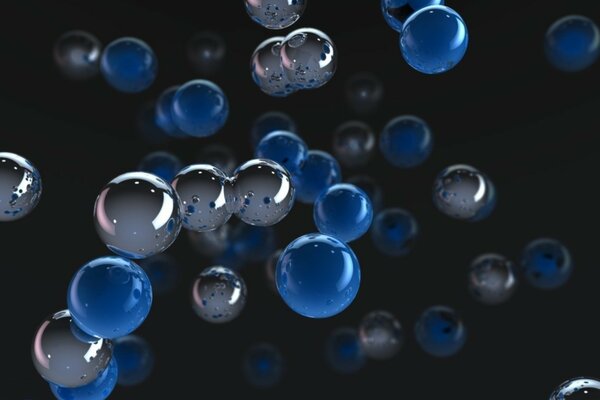 Turquoise and silver bubbles on a black background