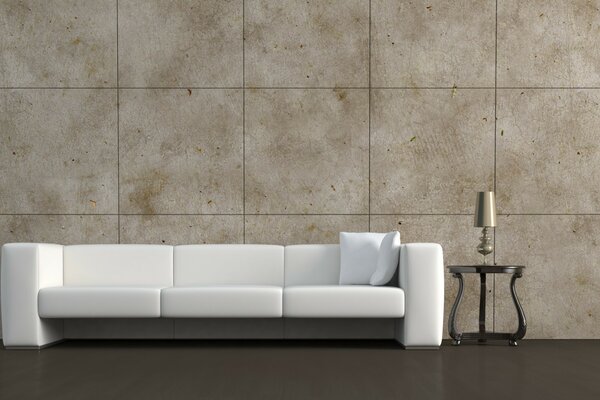 A white sofa and a night light on a table against a background of brown tiles and a glossy floor