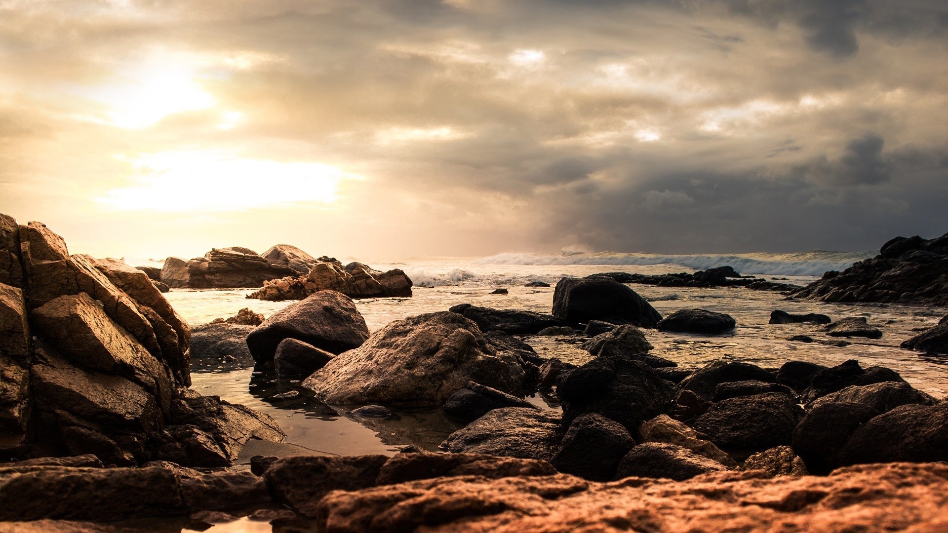 sea and ocean sunset water sea beach ocean dawn seashore seascape dusk evening landscape rock sky sun surf sand storm travel nature